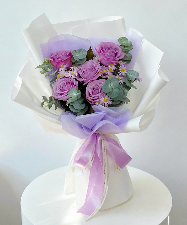 Bó hoa hồng tím pastel dịu dàng